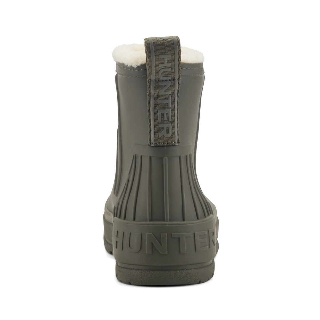 Insulated Willa Hunter  Boots rubber duck boot shown from the back, featuring a dark gray-green body, a white faux-fur collar, and a pull tab with the brand name 'HUNTER' embossed vertically.